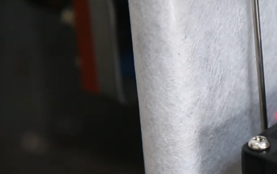 Image Description: A macro close-up of a high-performance non-woven fabric filter, showing the intricate fibrous texture and pore size optimized for cold brew extraction.